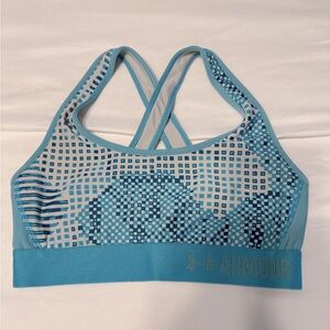 Under armor Blue sports bra with cool design and cross back straps- Size Small